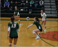  ?? PAUL DICICCO — FOR THE NEWS-HERALD ?? A Lake Catholic player bumps the ball to a teammate Oct. 28.