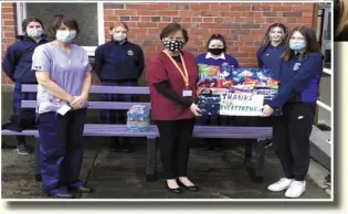 ??  ?? Left, representa­tives from Our Lady of Lourdes and St Brigid’s in Ardee and Dundalk Gardai who received gifts from the TYA class in the school.