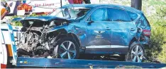  ?? Picture: AFP ?? Woods’ badly damaged vehicle after the smash.