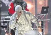  ?? DAVID RICHARD — THE ASSOCIATED PRESS ?? LL Cool J performs during the Rock & Roll Hall of Fame induction ceremony on Saturday in Cleveland.