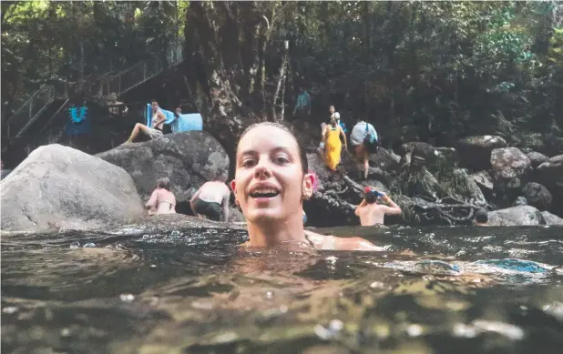  ?? Picture: BRENDAN RADKE ?? REFRESHING: Zeljana Pnjak-Frlan enjoys the cool waters of Josephine Falls near Innisfail at the weekend.