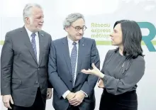  ?? GRAHAM HUGHES/THE CANADIAN PRESS ?? Caisse de depot et placement du Quebec President and CEO Michael Sabia, centre, Quebec Premier Philippe Couillard and Montreal mayor Valerie Plante chat following a news conference, Thursday, where they announced details of new automated light rail...