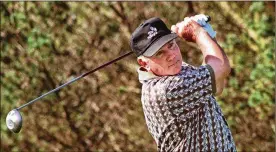  ?? STAFF FILE ?? Bob Zimmerman, a PGA Tour player in the 1960s, tees off on the 11th hole at Sugar Valley Country Club on Sept. 12, 1997, during the Nitro Senior Series Golf Tournament.