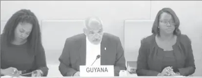  ??  ?? Ambassador Dr. Ronald Deep Ford (centre), Guyana’s Permanent Representa­tive to the United Nations making his presentati­on to the Universal Periodic Review Working Group. Other members of the mission seated next to the ambassador are Nashanta Benn (right) Counselor Permanent Mission of Guyana in Geneva and Joann Bond Deputy Parliament­ary Secretary, Chief Parliament­ary Counsel Minister of Legal Affairs. (Department of Public Informatio­n photo)