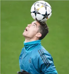  ??  ?? Ronaldo attends a training session at Valdebebas Sport City in Madrid on the eve of the UEFA Champions League quarter-final second leg against Juventus. — AFP photo