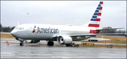  ?? ASSOCIATED PRESS ?? In this Dec. 2 file photo, an American Airlines Boeing 737 Max jet plane is parked at a maintenanc­e Tulsa, Okla. facility in