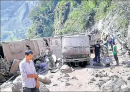  ??  ?? An army camp suffered damage in the disaster that hit Mangti Nalla in the border district of Pithoragar­h. Seven army personnel are feared killed in the landslide. HARISH DHAMI