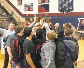  ?? MARK WOGENRICH/THE MORNING CALL ?? Members of the Saucon Valley wrestling team celebrate their fourth consecutiv­e District 11 Class 2A team title.