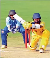  ?? — MURALI KRISHNA ?? Tamil Nadu’s Dinesh Karthik en route to his 28- ball 57 against Andhra at Visakhapat­nam on Monday.