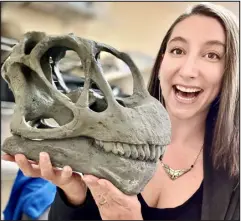  ?? PROVIDED BY AMY ATWATER ?? Amy Atwater is developmen­t and membership director at Dinosaur Ridge, with t he head of a camarasaur­us.