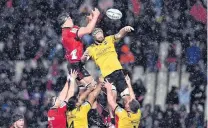  ?? PHOTO: GETTY IMAGES ?? Up, up and away . . . Scott Barrett of the Crusaders and Blade Thomson of the Hurricanes compete for lineout ball at AMI Stadium last night.