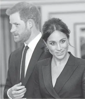  ??  ?? Harry and Meghan hit London for a charity performanc­e of “Hamilton” last month. POOL PHOTO BY DAN CHARITY