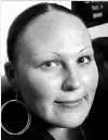  ??  ?? Cara Reid, a single mother of two, has reason to smile after a tenant ruling in her favour.