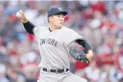  ??  ?? The Yankees’ Masahiro Tanaka pitches in the first inning against the Reds.