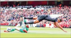  ?? AFP ?? Petr Cech saves from Everton forward Dominic Calvert-Lewin in their English Premier League match at the Emirates on Sunday.