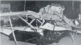  ?? Photo / Herald archives ?? The wreck of the Dornier Libelle flyingboat (right) that crashed into the sea in 1929, and the crowd at Milford beach around a Moth (above) whose pilot landed to help.