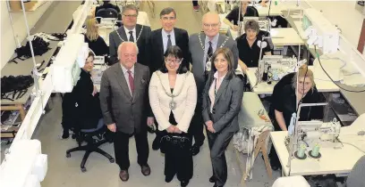  ??  ?? ●● Ron Smart, front left, with (clockwise from back left) Bollington mayor’s consort James Nicholas, MP David Rutley, Cheshire East mayor Wesley Fitzgerald, Jane Jones from Macclesfie­ld College and Bollington mayor Amanda Stott at RA Smart in Bollington