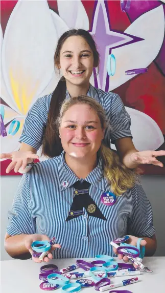  ?? Picture: SCOTT RADFORD- CHISHOLM ?? DEDICATED ADVOCATES: Year 12 students at St Patrick’s Alana Krause, 16, ( front) and Anna Chapman, also 16, are behind the Girl Up club.