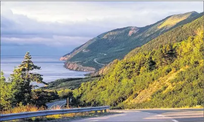  ?? PHOTO SUBMITTED BY PARKS CANADA ?? The Cabot Trail is one of Cape Breton’s iconic tourist draws. Parks Canada sites in Cape Breton have seen significan­t increases in visitor numbers so far this summer.