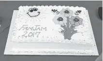  ??  ?? Julie Duncan, a teacher at Manor Park Public School and the person behind FamJam, greeted students and families with this special cake.