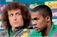  ?? Reuters ?? Douglas Costa and David Luiz during a news conference. —