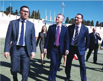  ??  ?? Photo: PN Leader Dr Simon Busuttil and Opposition spokesman on Sports, David Agius, with MFA secretary general Dr Angelo Chetcuti, touring the national stadium