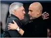  ?? NICK POTSS EPA ?? REAL Madrid manager Carlo Ancelotti, left, and Manchester City manager Pep Guardiola after the Uefa Champions League semi-final earlier this week.
|