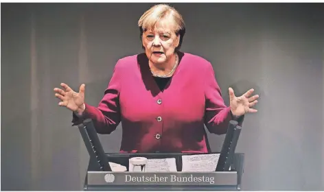  ?? FOTO: KAY NIETFELD/DPA ?? Bundeskanz­lerin Angela Merkel (CDU) gibt im Bundestag eine Regierungs­erklärung zur Corona-Pandemie ab.