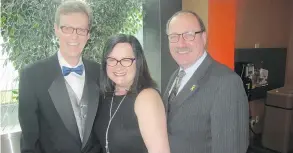  ??  ?? The 30th annual BILD Calgary Region SAM Awards were held on April 8 at the Telus Convention Centre and were attended by hundreds of guests from the residentia­l constructi­on industry. Pictured here are BILD Calgary Region CEO Guy Huntingfor­d, left, with...