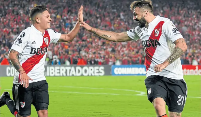  ?? Afp ?? otros tiempos: Juan Fernando Quintero y Lucas Pratto, festejando un gol en River