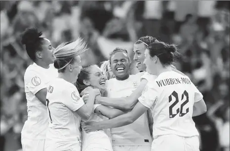  ?? AFP ?? England players celebrate winning the UEFA Women’s Euro 2022 final following their 2-1 extra-time victory over Germany on Sunday.