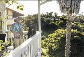  ?? Christina House Los Angeles Times ?? LEONARD PAGARIGAN, 74, plays the saxophone on his deck in Rolling Hills Estates. He’s been doing so twice a week during California’s stay-at-home orders.