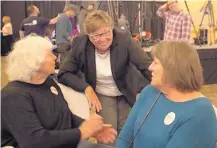  ?? JOSH BACHMAN/ LAS CRUCES SUN-NEWS ?? Kim Stewart, winner in the race for sheriff of Doña Ana County, talks with supporters Joan Keif, left, and Beverly Stotz, right, at the Las Cruces Convention Center during a Democratic Party watch party Tuesday.