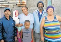  ?? Picture: GUY ROGERS ?? NONSTOP BITING: Like all residents in Mackay’s Ground, from left, Jan Willemse, Veronica and Clintonia Demaar, 2, Zalin Demaar, 7, Sammy Baartman and Jennifer Visagie are enduring sleepless nights because of the mosquitoes