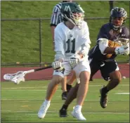  ?? ED MORLOCK — MEDIANEWS GROUP ?? Methacton’s Matt Cole takes a shot while Upper Merion’s Qwynne Seals defends.