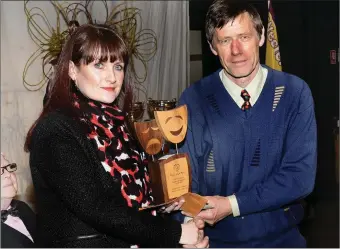  ??  ?? Jacinta Flannery presents the Flannery family award for the Audience Award to the Director of Brideview Jack Aherne - Drama group for their presentati­on of Stolen Child. The trophy is titled the Audience Award.