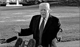  ?? OLIVIER DOULIERY/ABACA PRESS ?? President Donald Trump talks to reporters before departing the White House on Tuesday.