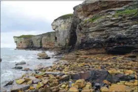  ?? MICHELLE LOCKE VIA AP ?? The rocky southern coastline of the Isle of Skye off the west coast of Scotland where Bonny Prince Charlie is said to have found shelter in a cave during his flight from government troops in 1746. Visitors to Skye can take boat trips to this spot or...
