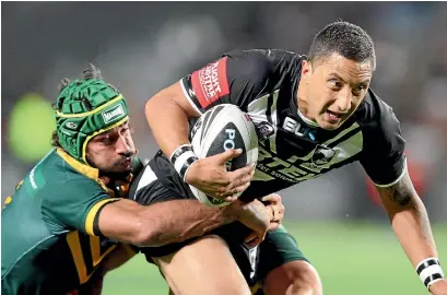  ?? PHOTO: JASON OXENHAM/STUFF ?? Benji Marshall is tackled by Johnathan Thurston during a 2012 test between New Zealand and Australia at Eden Park.