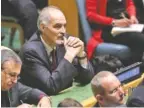  ?? AP PHOTO/BEBETO MATTHEWS ?? Syria’s United Nations ambassador, Bashar Jaafari, center, listens as U.S. President Donald Trump addresses the United Nations General Assembly on Tuesday.