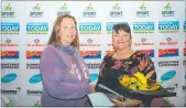  ??  ?? Councillor Hull representi­ng her daughter Rebecca Mahoney who was Tararua Sports Official of the Year.