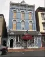  ?? NICHOLAS BUONANNO — NBUONANNO@TROYRECORD.COM ?? Smith’s Restaurant of Cohoes on Remsen Street now has several boarded up windows after the restaurant received damage from a Thursday afternoon blaze that destroyed more than 20 buildings in the downtown area.