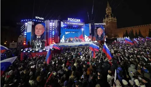  ?? ?? Un concert célèbre la victoire à l'élection présidenti­elle de Vladimir Poutine et le 10e anniversai­re de l'annexion de la Crimée, sur la place Rouge à Moscou, le 18 mars 2024.