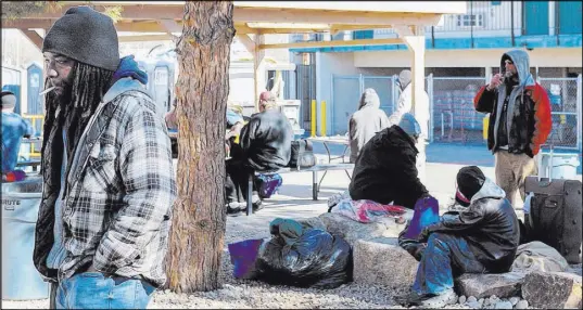  ?? Caroline Brehman Las Vegas Review-Journal ?? Clients hang out on Thursday at the city of Las Vegas’ homeless courtyard. The courtyard provides people with services.