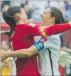  ?? RIC ERNST/PNG FILES ?? Carli Lloyd, right, celebrates her third goal with goalkeeper Hope Solo against Japan at B.C. Place Stadium.