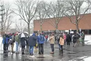  ?? COURTNEY HERGESHEIM­ER/COLUMBUS DISPATCH ?? A crowd of media and supporters gather Feb. 18 as Edith Espinal goes to meet with Immigratio­n and Customs Enforcemen­t at their offices in Westervill­e to ask for a stay of deportatio­n.