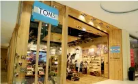  ??  ?? Toms has given 50 million pairs of shoes to children in need and restored eyesight to 360,000 people.