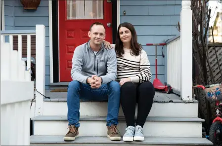  ?? KAYANA SZYMCZAK — THE NEW YORK TIMES ?? Nick Herbold and Christiann­e Sharr, Ricardo’s first foster parents, at their home in Cambridge, Mass., on Feb. 20. Ricardo’s mother, Olga, a Honduran immigrant, came to the United States fleeing her abuser, but when child welfare got involved, she risked losing her son forever.