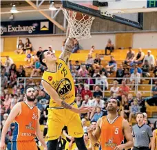  ?? PHOTO: STUFF ?? National league basketball­er Tony Tolovae made a guest appearance for University in the men’s club championsh­ip on Saturday scoring 34 points.