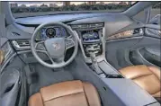  ??  ?? The ELR features rich leather, as well as CUE infotainme­nt and navigation and Bose 10-speaker audio systems.
